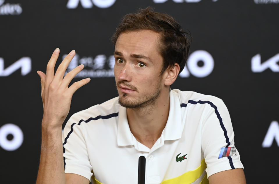 Russia's Daniil Medvedev gestures during a press conference after his loss in the men's singles final to Serbia's Novak Djokovic at the Australian Open tennis championship in Melbourne, Australia, Sunday, Feb. 21, 2021.(Vince Caligiuri/Tennis Australia via AP)