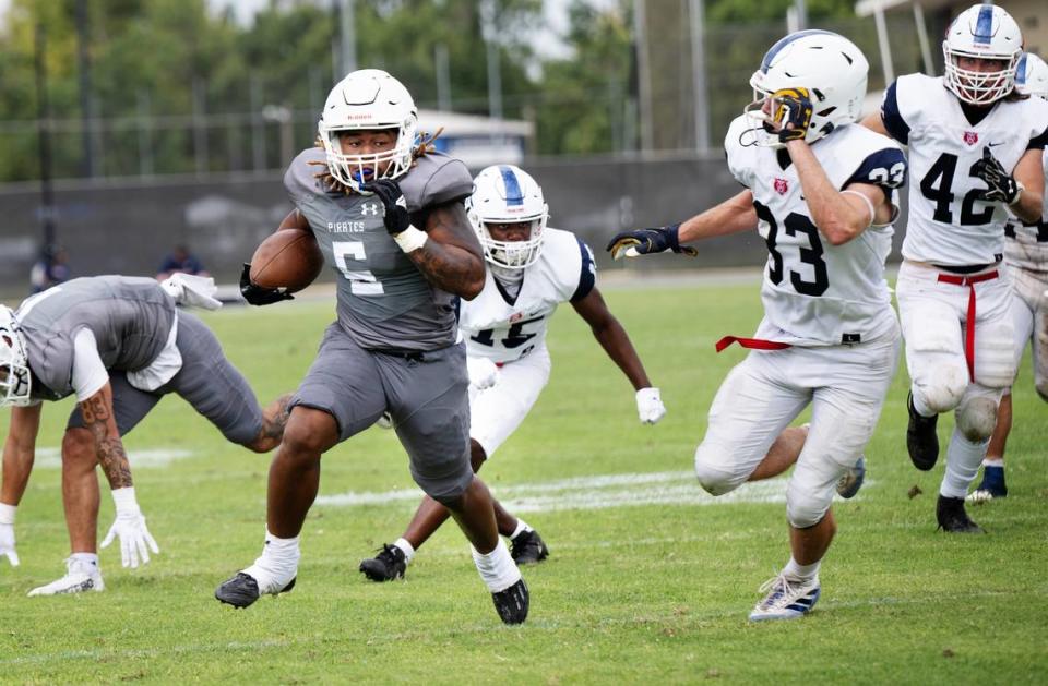 Modesto’s Alonzo Jackson breaks toward the end zone on a run during the game with Santa Rosa at Modesto Junior College in Modesto, Calif., Saturday, September 9, 2023. Modesto won the game the game 51-41.