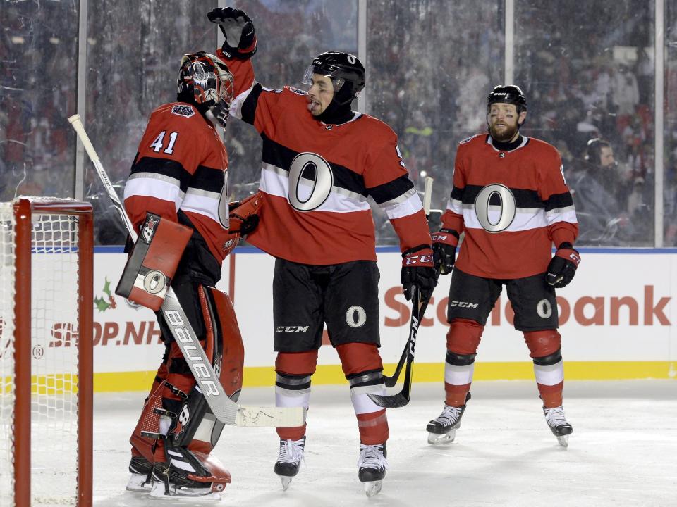 <p>Teammates congratulate Craig Anderson after he posts a shutout in the NHL 100 Classic to give the Senators their second straight win after a very tumultuous few weeks. </p>