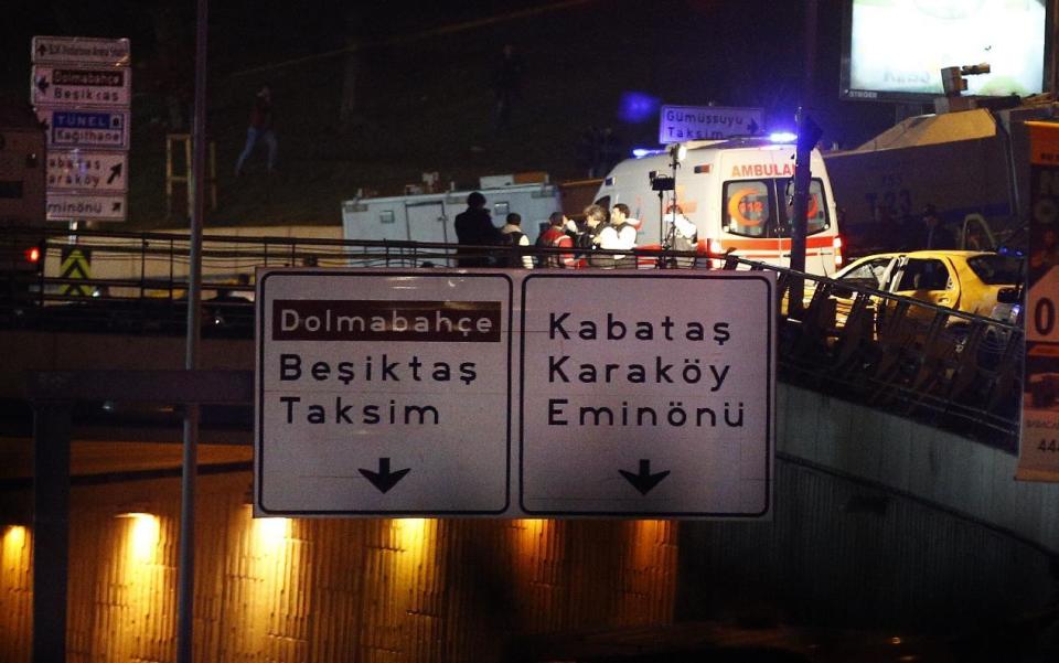 Rescue services work at the scene of explosions near the Besiktas football club stadium, in Istanbul, late Saturday, Dec. 10, 2016. Two loud explosions have been heard near the newly built soccer stadium and witnesses at the scene said gunfire could be heard in what appeared to have been an armed attack on police. Turkish authorities have banned distribution of images relating to the Istanbul explosions within Turkey. (AP Photo/Emrah Gurel) TURKEY OUT