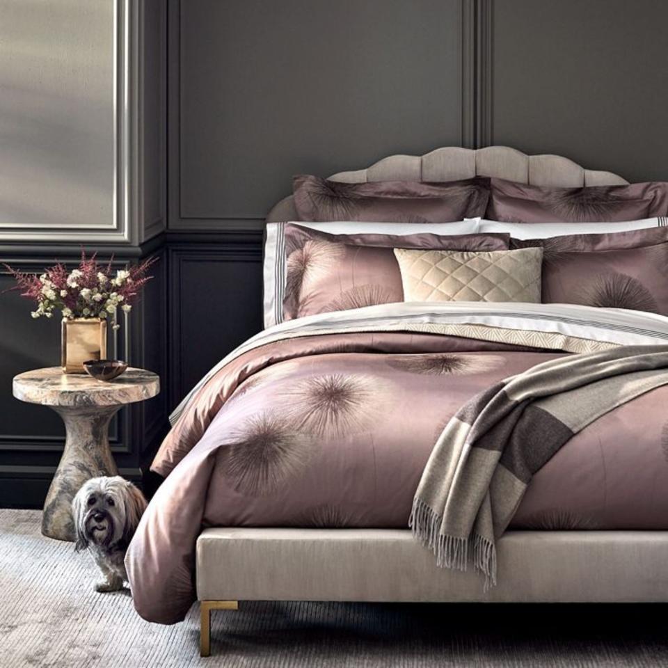 Frette Soffioni Bedding Collection on a bed.