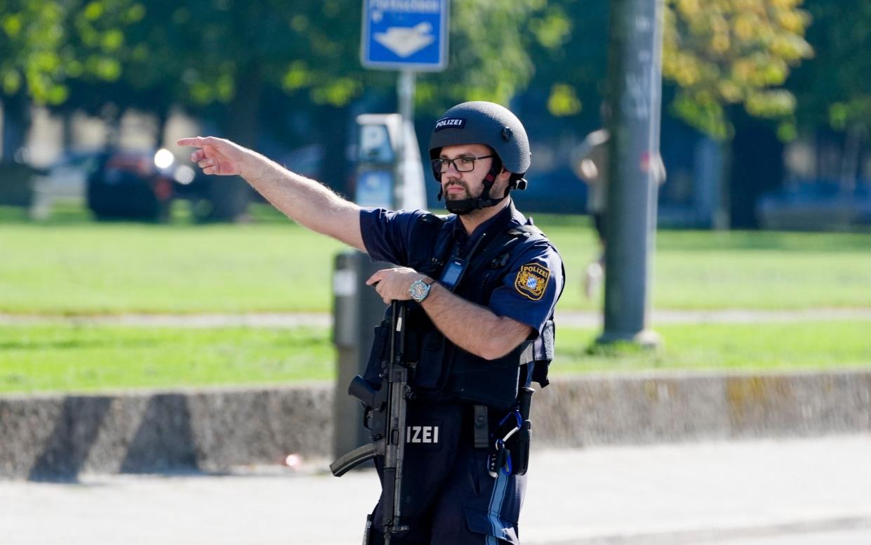 A policeman on patrol after officers fired shots at a suspicious person near the Israeli Consulate and a museum on the city's Nazi-era history in Munich