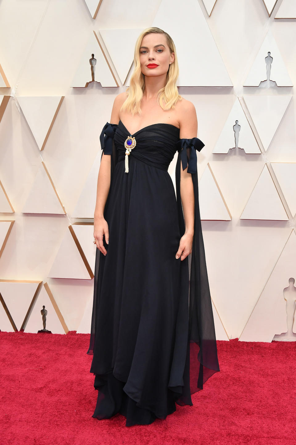 Margot Robbie attends the 92nd Annual Academy Awards  in off shoulder Chanel gown with broach at Hollywood and Highland on February 09, 2020 in Hollywood, California. (Photo by Amy Sussman/Getty Images)