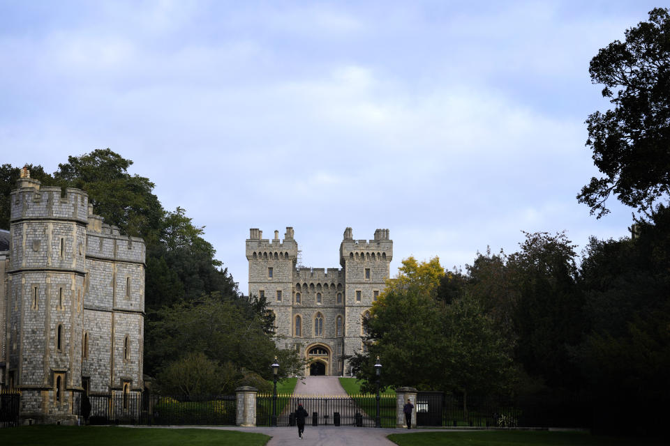 A view from the Long Walk to Windsor Castle, in Windsor, England, Friday, Oct. 22, 2021. Britain's Queen Elizabeth II spent a night in a hospital for checks this week after canceling an official trip to Northern Ireland on medical advice, Buckingham Palace said Thursday. The palace said the 95-year-old British monarch went to the private King Edward VII's Hospital in London on Wednesday for "preliminary investigations." It said she returned to her Windsor Castle home at lunchtime on Thursday, "and remains in good spirits. (AP Photo/Kirsty Wigglesworth)