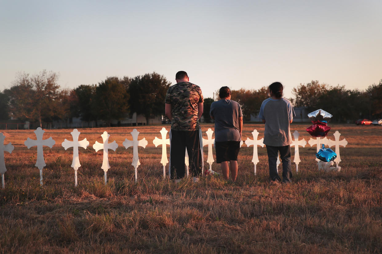 Twenty-six crosses stand in a field to honor the victims killed during the mass shooting at the First Baptist Church of Sutherland Springs (Scott Olson / Getty Images)