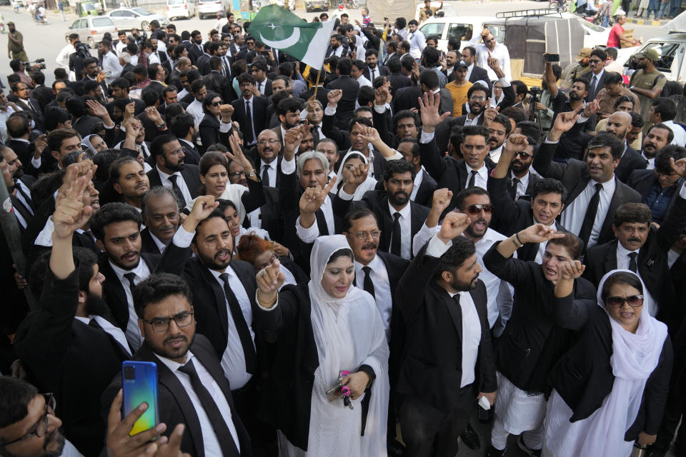 Lawyers participate in a rally against the recent increase in electricity and fuel prices and demanding the announcement of parliamentary election, in Lahore, Pakistan, Thursday, Sept. 21, 2023. Pakistan's election oversight body announced on Thursday that it will hold the next parliamentary elections in the last week of January, delaying the vote which was to be held in November under the constitution. (AP Photo/K.M. Chaudary)