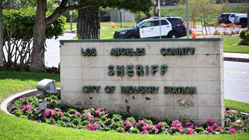 PHOTO: A sheriff's car is seen behind a sign at the entrance of the Los Angeles County Sheriff's Station, in City of Industry, Calif., on March 25, 2024.  (Robyn Beck/AFP via Getty Images, FILE)