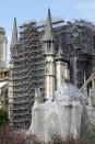 A view shows the Notre-Dame de Paris Cathedral, which was damaged in a devastating fire one year ago, as the coronavirus disease (COVID-19) lockdown slows down its restoration in Paris, France, April 11, 2020. (REUTERS/Charles Platiau)