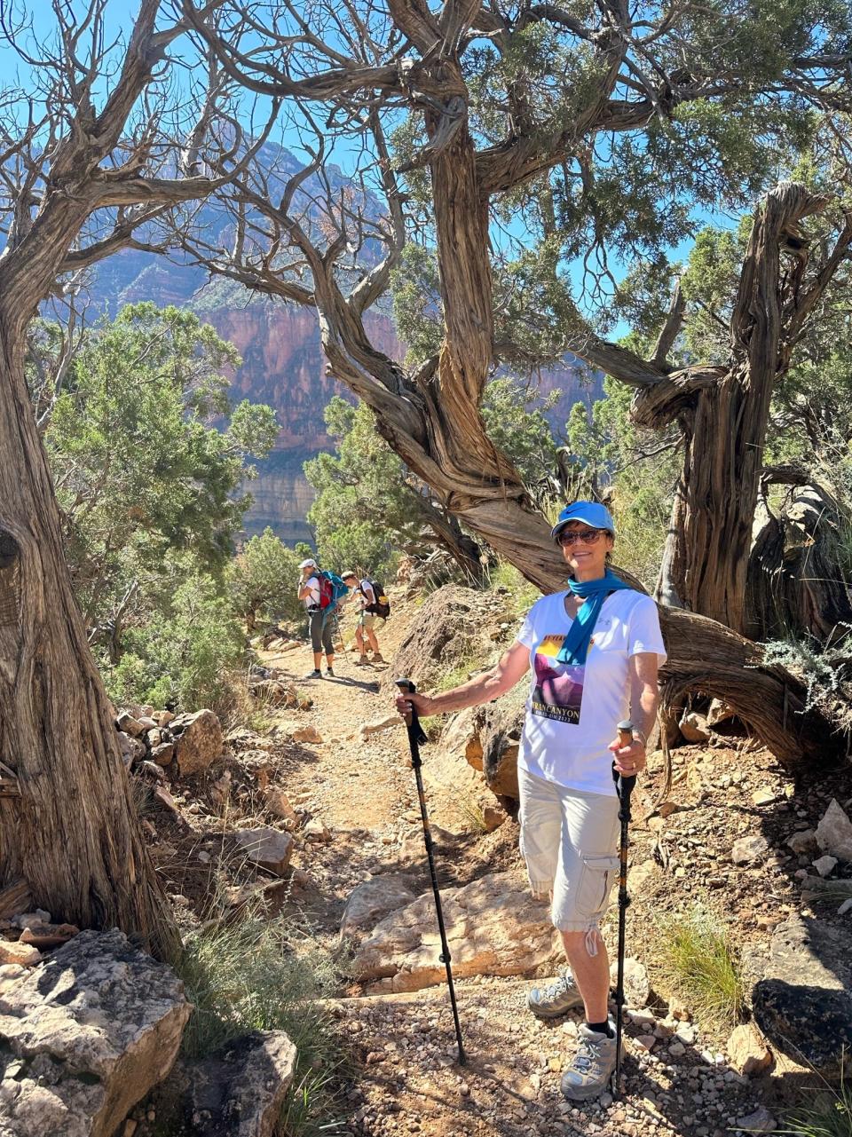 Fran Anderson, 81, of Orange, California, takes a photo break on her 21-hour hike at the Grand Canyon on Sept. 3, 2023. After overcoming many health issues, Anderson insisted on carrying her do-not-resuscitate healthcare directive, making jokes about it the whole time. She finished around 2:45 a.m. on Sept. 4, about 21 hours after she began hiking.