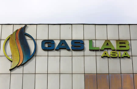 A logo of Gas Lab Asia is seen at its headquarters building in New Delhi, India, March 8, 2017. REUTERS/Adnan Abidi