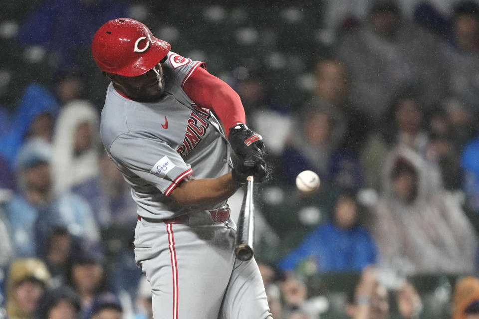 Cincinnati Reds' Jeimer Candelario hits an RBI single off Chicago Cubs pitcher Justin Steele during the fourth inning of a baseball game Saturday, June 1, 2024, in Chicago. (AP Photo/Charles Rex Arbogast)