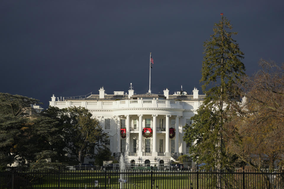 The White House decorated with wreaths.