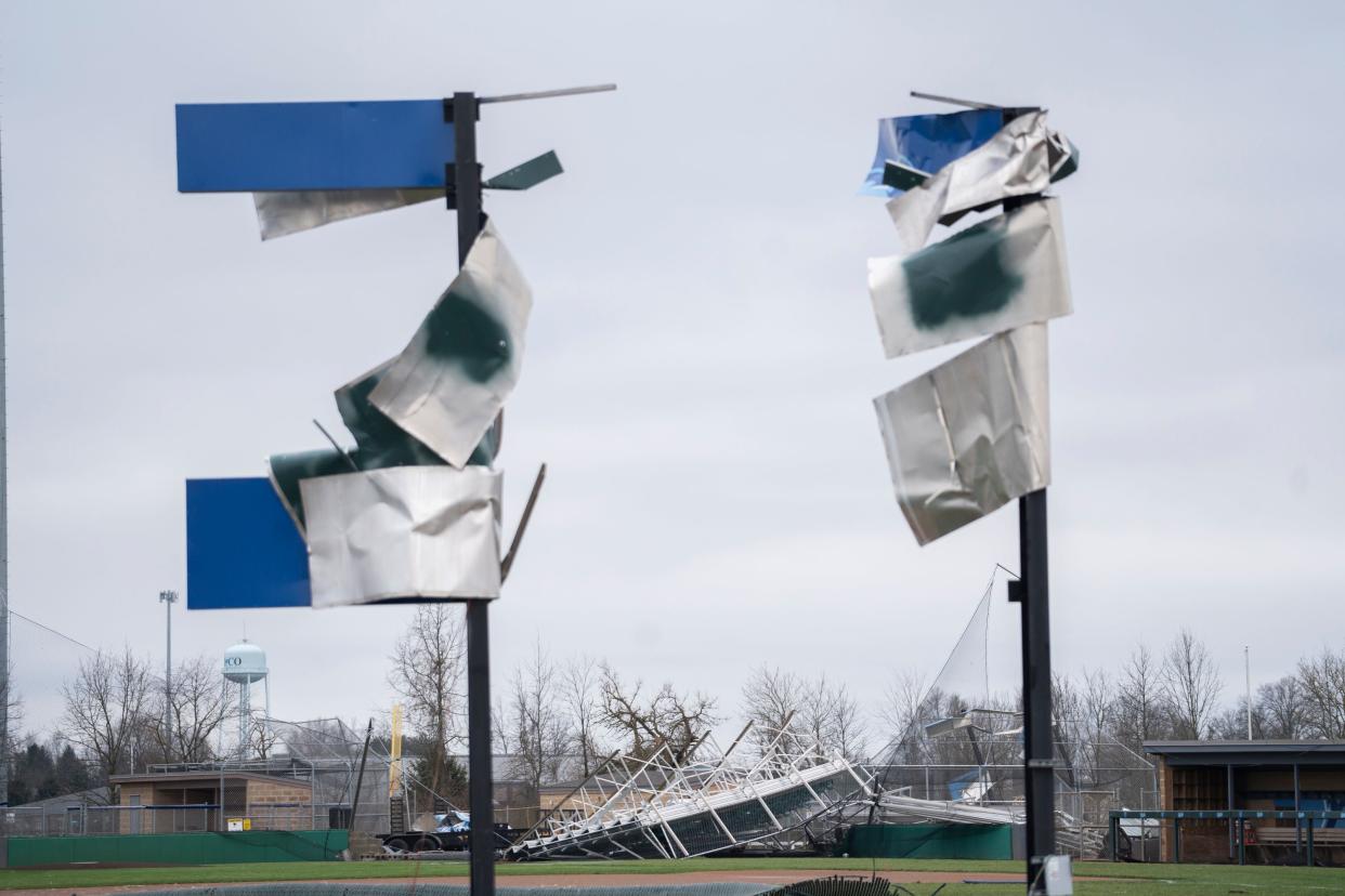 The sign and baseball field at Olentangy Berlin High School were damaged in storms Thursday night.