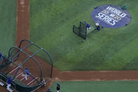 Members of the Tampa Bay Rays warms up during batting practice before Game 1 of the baseball World Series against the Los Angeles Dodgers Tuesday, Oct. 20, 2020, in Arlington, Texas. (AP Photo/David J. Phillip)