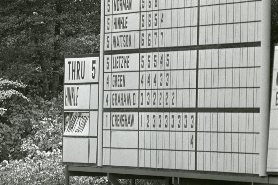 Tom Watson's name is adjusted on the thru board during the 1981 Masters at Augusta.
