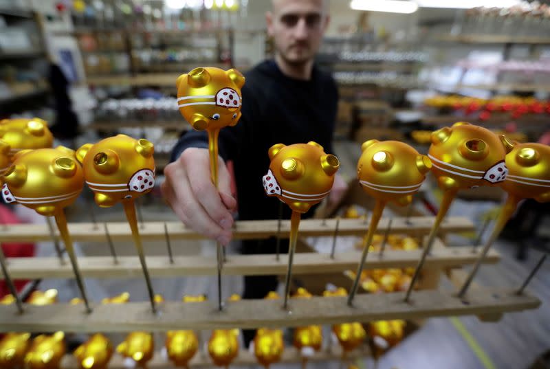 Masked Golden Pig Christmas tree decorations are made in Dvur Kralove nad Labem