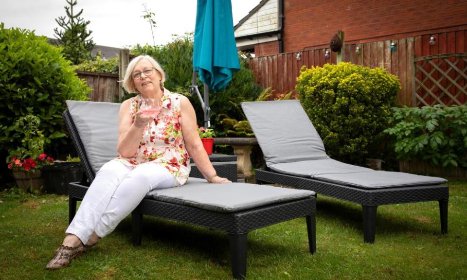 Dorothy at home with her new sunloungers and cool box