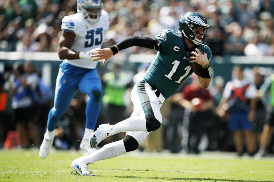 Philadelphia Eagles' Carson Wentz scrambles during the first half of an NFL football game against the Detroit Lions, Sunday, Sept. 22, 2019, in Philadelphia. (AP Photo/Matt Rourke)