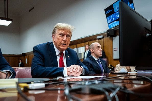 NEW YORK, NEW YORK - APRIL 15: Former U.S. President Donald Trump appears with his legal team ahead of the start of jury selection at Manhattan criminal court on April 15, 2024 in New York City. Former President Donald Trump faces 34 felony counts of falsifying business records in the first of his criminal cases to go to trial.  (Photo by Jabin Botsford-Pool/Getty Images)