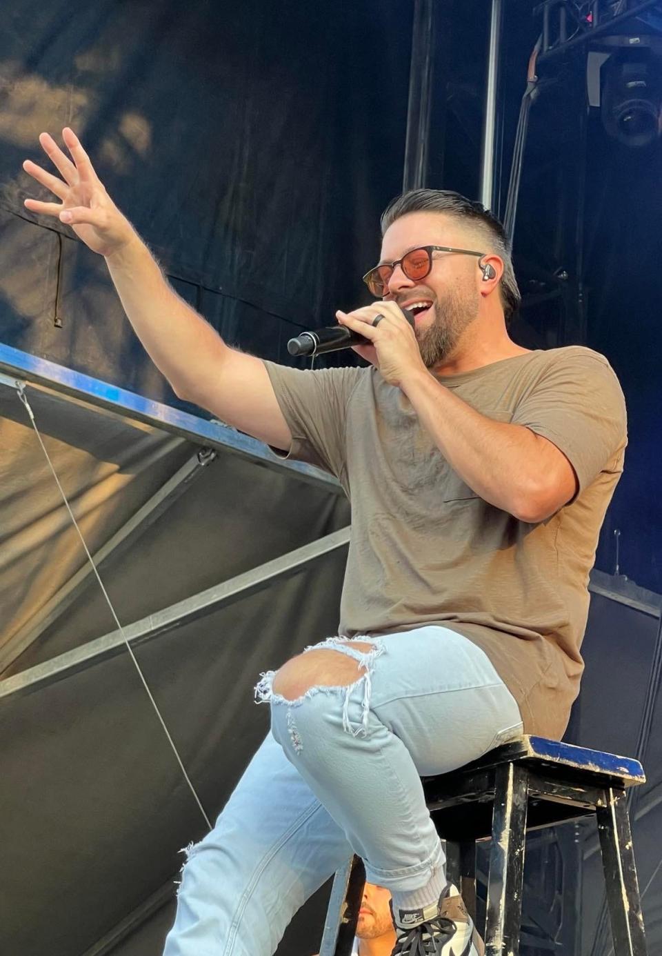 Danny Gokey, a former finalist on "American Idol," performs on Thursday during the opening of the Alive Music Festival at Atwood Lake Park in the Mineral City area.