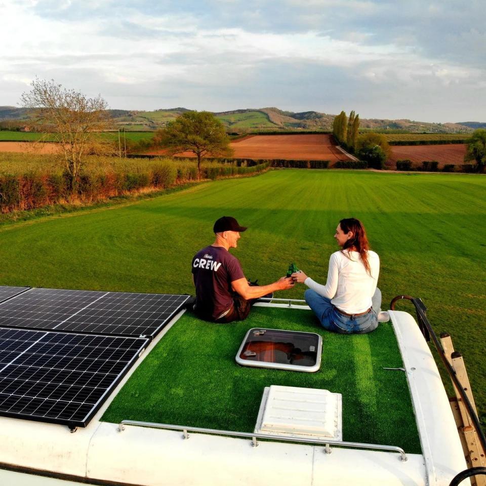 Solar panels and a rooftop garden on top of the bus (Lamorna Hollingsworth/@we_bought_a_double_decker)