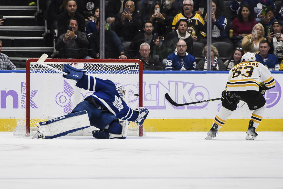 Boston Bruins forward Brad Marchand (63) scores on Toronto Maple Leafs goaltender Ilya Samsonov (35) on a penalty shot during the second period of an NHL hockey game, Saturday, Nov. 5, 2022 in Toronto. (Christopher Katsarov/The Canadian Press via AP)