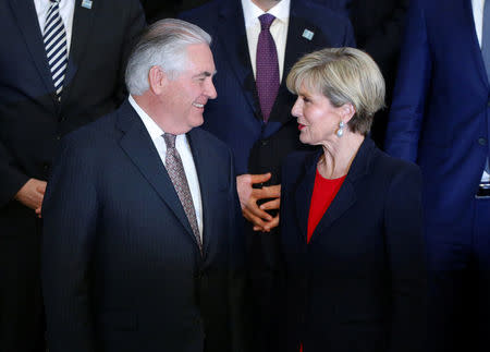 Secretary of State Rex Tillerson and Australian Foreign Minister Julie Bishop speak during the delegation photo with leaders from the Global Coalition - Working to Defeat ISIS at the State Department in Washington, DC, U.S., March 22, 2017. REUTERS/Joshua Roberts