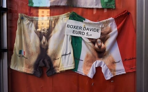 Images of David's genitalia are on sale for tourists in piazzas across Italy - Credit: Richard BakerItaly /Alamy