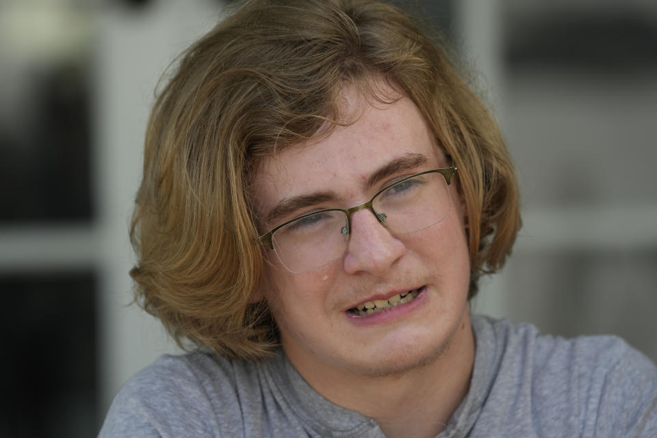 Ray Walker, 17, speaks about his need to move to Virginia for continued gender-affirming care and the effects on his family, Wednesday, June 28, 2023, in Madison County, Miss. This year, Republican Gov. Tate Reeves signed legislation banning gender-affirming care for anyone younger than 18. (AP Photo/Rogelio V. Solis)