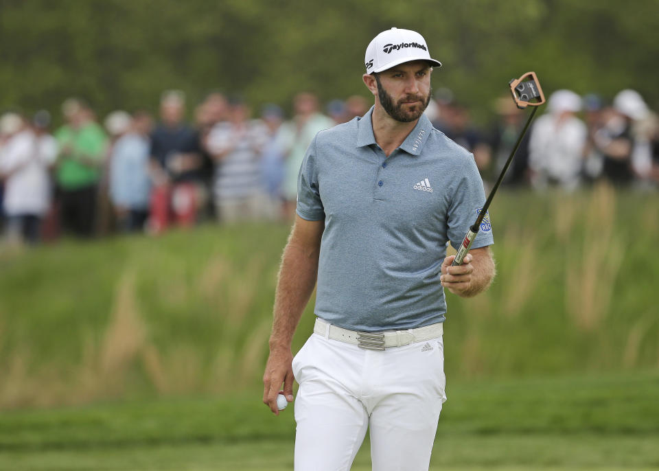 Dustin Johnson walks off the 12th green during the final round of the PGA Championship golf tournament, Sunday, May 19, 2019, at Bethpage Black in Farmingdale, N.Y. (AP Photo/Seth Wenig)