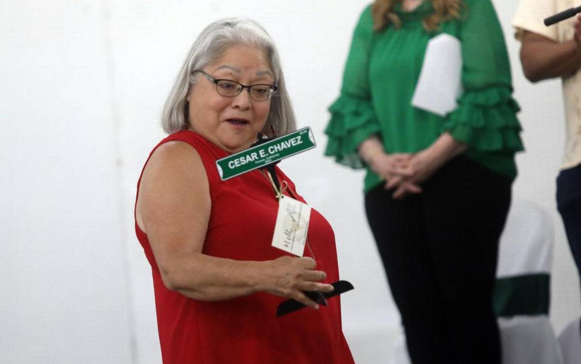 Gloria Hernández received a rreplica of a street sign during the celebration of the renaming of Kings Canyon and two other streets in honor of farmworker icon César E. Chávez. The celebration took place at the Fresno fairgrounds on June 10, 2023.