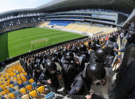 Riot policemen on an exercise at Lviv Arena stadium last week, as part of preparations for the Euro 2012 football tournament. A new film shows Soviet footballers refusing to throw a game against Nazi occupiers though they know it will lead to their deaths