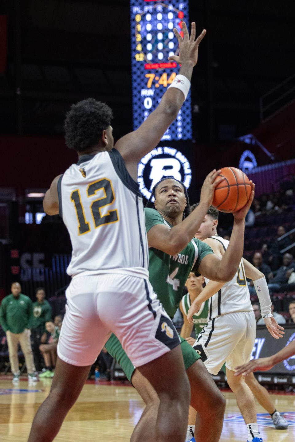 Richwoods Lathan Sommerville pulls up and shoots. Richwoods Knights vs College Achieve Knights of Asbury Park in The Battle basketball series at Rutgers on December 29, 2023.