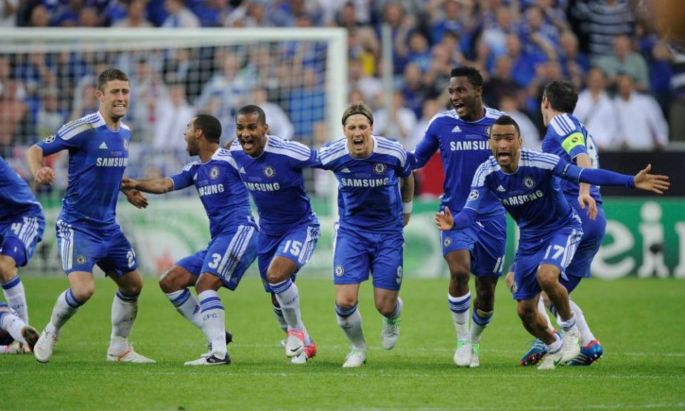 Chelsea react to Didier Drogba’s winning penalty.