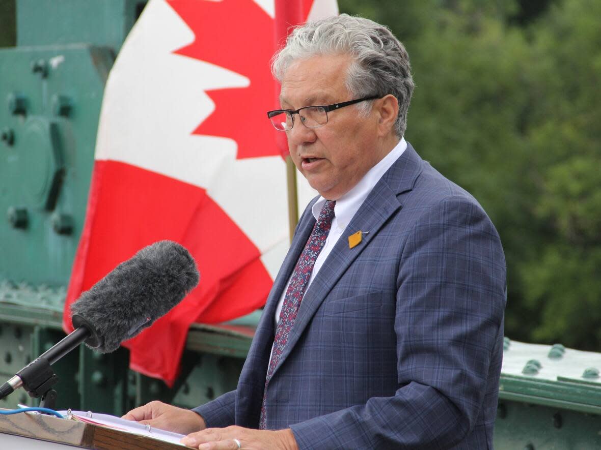 Northern Affairs Minister Dan Vandal speaks at a funding announcement in Manitoba. Vandal was in Yellowknife on Saturday for a funding announcement that included $34 million to Métis communities for housing projects.    (Ian Froese/CBC - image credit)