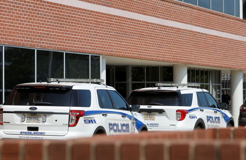 A police cruiser sits outside the office of U.S. Rep. Gerry Connolly after baseball bat attack on his staff in Fairfax, Virginia