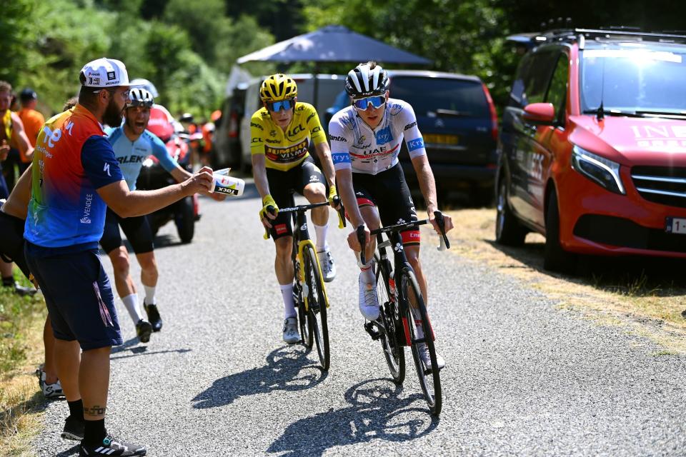 Jonas Vingegaard follows Tadej Pogacar up a climb in the 2022 Tour de France