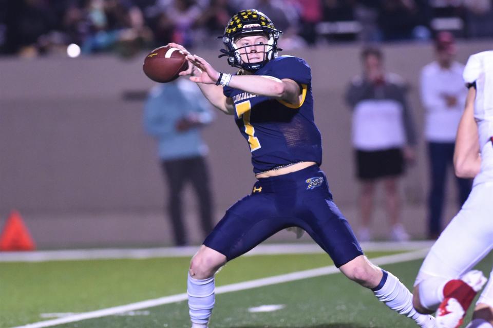 Stephenville quarterback Ryder Lambert (7) gets set to throw a pass during the Region II-4A Division I final against Melissa at Pennington Field in Bedford on Dec. 3, 2021