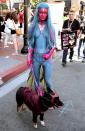 <p>Cosplayer dressed as Vision with her dog dressed as Scarlet Witch at Comic-Con International on July 20, 2018, in San Diego. (Photo: Quinn P. Smith/Getty Images) </p>