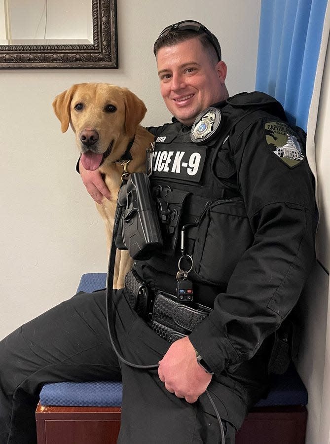 Gatsby and his handler, William Boyer, an officer with Capitol Police.