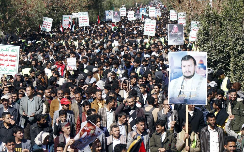 Houthi supporters in Sana'a, Yemen, stage a rally against US and UK attacks