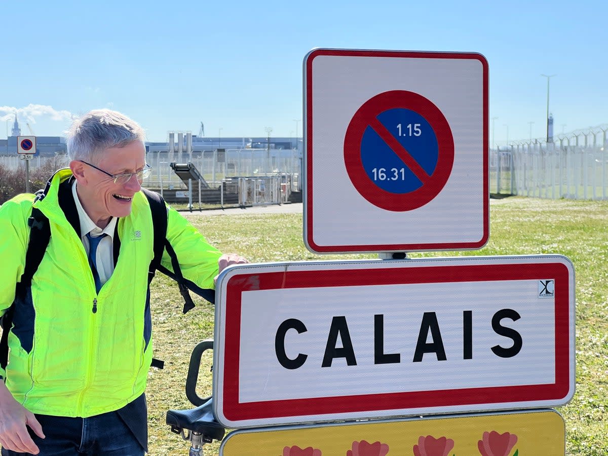 Journey’s end: Simon Calder at the entrance to Calais (Simon Calder)