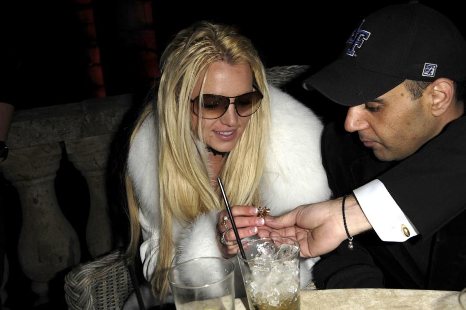 <div class="inline-image__caption"><p>Britney Spears celebrates her birthday with then-manager Sam Lufti in 2007.</p></div> <div class="inline-image__credit">Toby Canham/Getty</div>