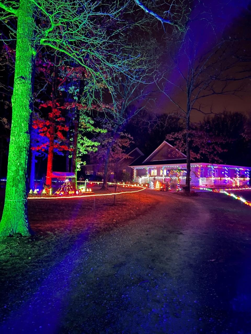 Ron and Valerie Willis go big with their Christmas lights each year at their home located at 3030 State Highway B in Rogersville. Their display features thousands of strung lights on their porch and each tree in their front yard is illuminated by a colored spotlight.