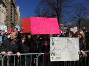 <p>Demonstrators hold up signs during the “Not My President’s Day” rally at Central Park West in New York City on Feb. 20, 2017. (Gordon Donovan/Yahoo News) </p>