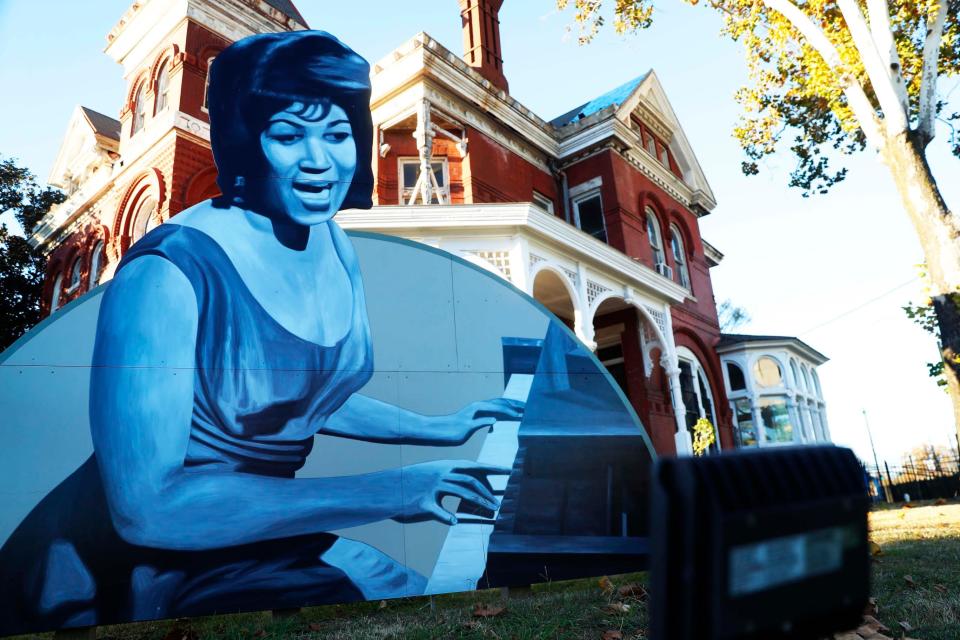 A cut-out of "Queen of Soul" Aretha Franklin can be seen on Tuesday, Dec. 5, 2023, in front of the historic Lowenstein House at Jefferson and Manassas in Memphis, Tenn. Created and installed by California artist John Cerney, the cut-out was commissioned by Memphis/Los Angeles investor/developer William Townsend.