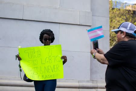 Transgender rights activists protest the recent killings of three transgender women, Muhlaysia Booker, Claire Legato, and Michelle Washington, during a rally at Washington Square Park in New York, U.S., May 24, 2019. REUTERS/Demetrius Freeman