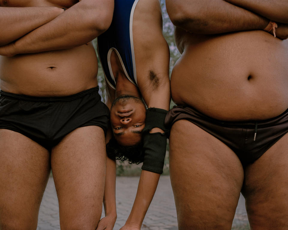 Chotu Lal Upside Down between two other people's bellies