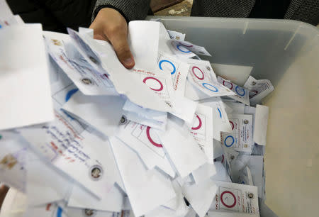 Officials count ballots on the final day of the referendum on draft constitutional amendments, in Cairo, Egypt April 22, 2019. REUTERS/Mohamed Abd El Ghany
