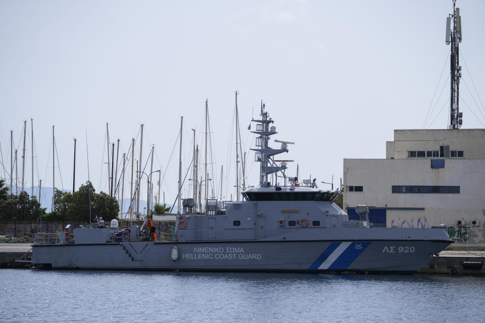 A Greek coast guard vessel is docked at the port in Kalamata town, about 240 kilometers (150 miles) southwest of Athens, on Thursday, June 15, 2023. A fishing boat crammed to the gunwales with migrants trying to reach Europe capsized and sank Wednesday June 14 off the coast of Greece, authorities said, leaving at least 79 dead and many more missing in one of the worst disasters of its kind this year. (AP Photo/Thanassis Stavrakis)